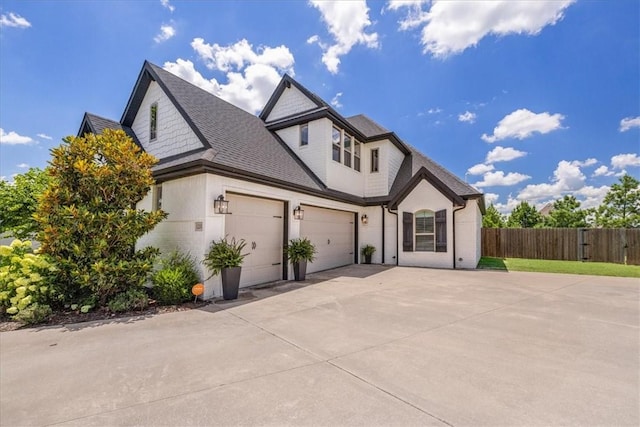 1200 Birkshire Cir, Cave Springs, AR 72718 - view of front of home featuring driveway, a garage, and a shingled roof