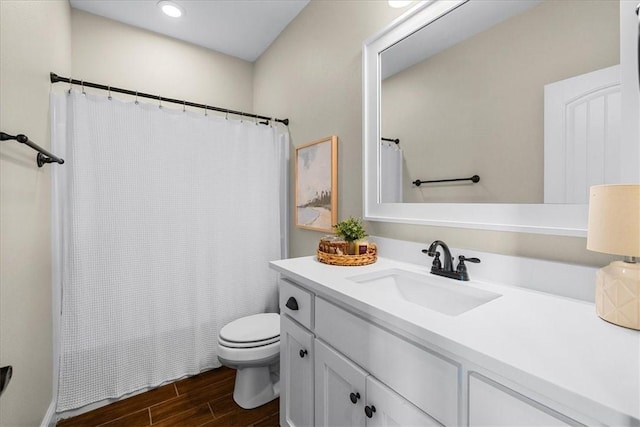 1200 Birkshire Cir, Cave Springs, AR 72718 - full bathroom with vanity, wood finished floors, a shower with shower curtain, and recessed lighting