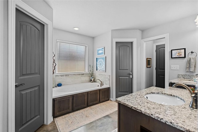 4278 W Anthem Dr, Fayetteville, AR 72704 - full bath with vanity, a bath, and concrete floors