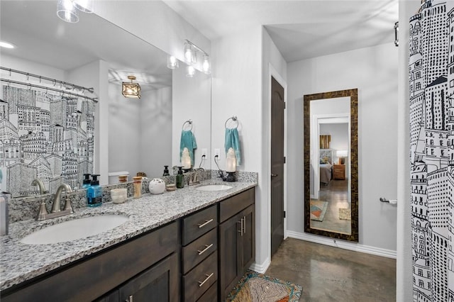 4278 W Anthem Dr, Fayetteville, AR 72704 - full bath featuring double vanity, finished concrete flooring, curtained shower, and ensuite bath