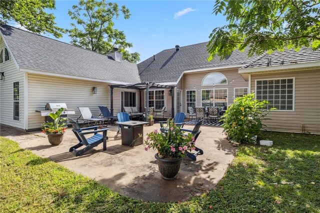 1112 N Oriole Ave, Rogers, AR 72756 - view of patio / terrace featuring an outdoor fire pit, a pergola, and a grill