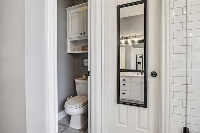 1112 N Oriole Ave, Rogers, AR 72756 - bathroom featuring vanity and tile patterned flooring