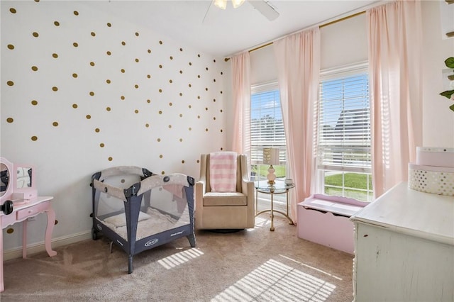 1112 N Oriole Ave, Rogers, AR 72756 - bedroom with light carpet, wallpapered walls, and a ceiling fan