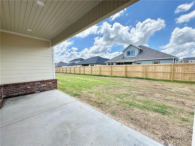 6003 SW Desert Ave, Bentonville, AR 72713 - view of yard with a patio