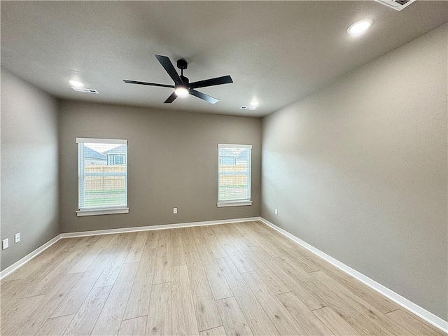 6003 SW Desert Ave, Bentonville, AR 72713 - unfurnished room with light wood-style floors, ceiling fan, and recessed lighting