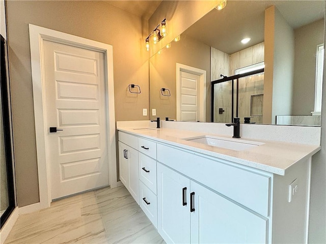 6003 SW Desert Ave, Bentonville, AR 72713 - full bath featuring marble look tiles, double vanity, and a stall shower
