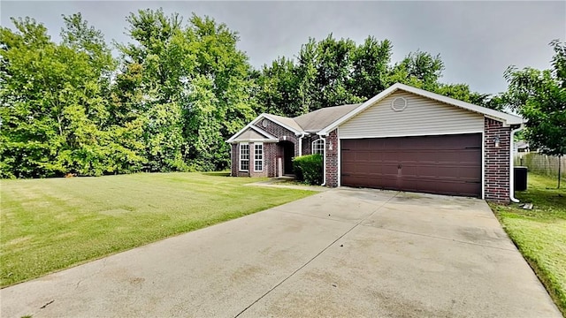 3107 SW Wentworth Ave, Bentonville, AR 72713 - view of front of property with a garage, brick siding, a front yard, and concrete driveway