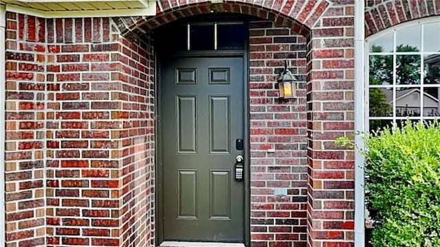 3107 SW Wentworth Ave, Bentonville, AR 72713 - view of exterior entry featuring brick siding