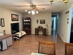411 Natchez Trace St, Harrison, AR 72601 - living area featuring ceiling fan and wood finished floors