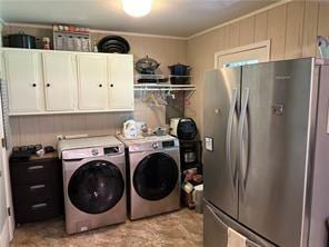 411 Natchez Trace St, Harrison, AR 72601 - washroom with washer and dryer and cabinet space