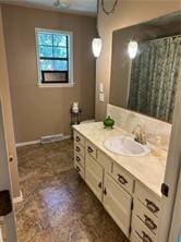 411 Natchez Trace St, Harrison, AR 72601 - full bathroom with vanity and baseboards