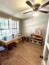 411 Natchez Trace St, Harrison, AR 72601 - dining space featuring ceiling fan and wood finished floors