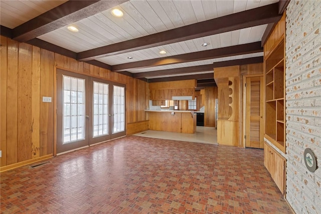 12158 E 62nd Hwy, Harrison, AR 72601 - unfurnished living room with wooden walls, a wooden ceiling with exposed beams, and french doors