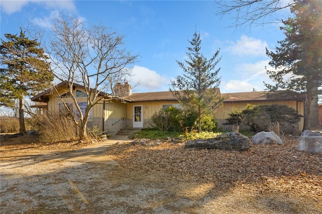 12158 E 62nd Hwy, Harrison, AR 72601 - view of front of home featuring a chimney and brick siding