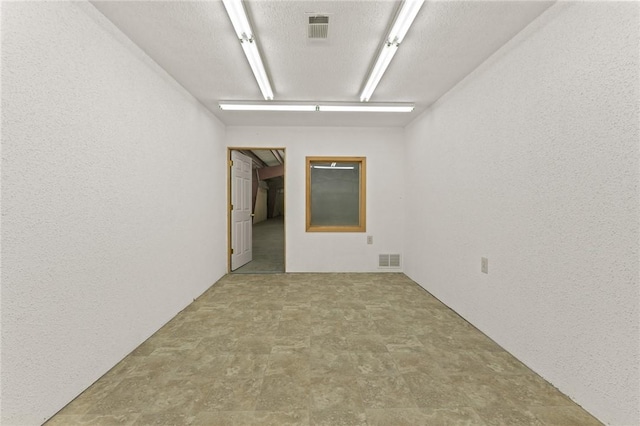 12158 E 62nd Hwy, Harrison, AR 72601 - spare room featuring a textured wall
