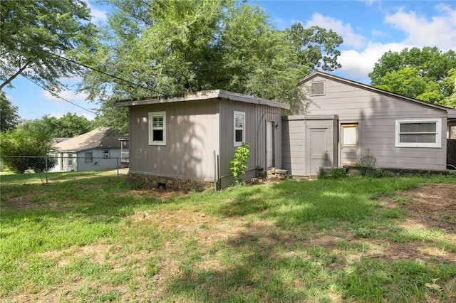 702 E Argyle, Harrison, AR 72601 - rear view of property with an outbuilding