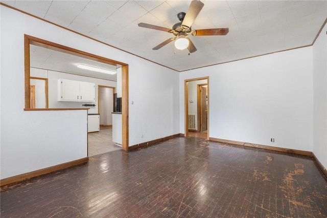 702 E Argyle, Harrison, AR 72601 - unfurnished room featuring a ceiling fan and ornamental molding
