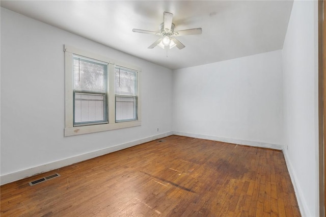 702 E Argyle, Harrison, AR 72601 - empty room featuring hardwood / wood-style floors and a ceiling fan