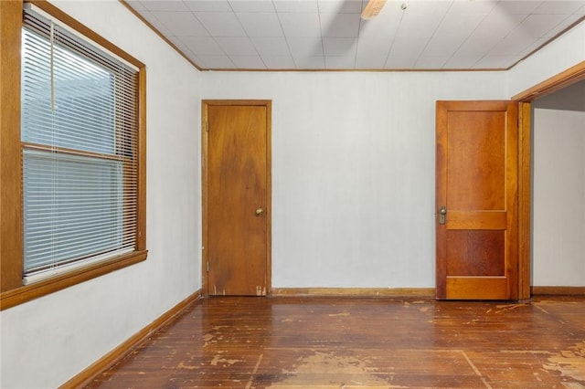 702 E Argyle, Harrison, AR 72601 - unfurnished room featuring hardwood / wood-style flooring and crown molding