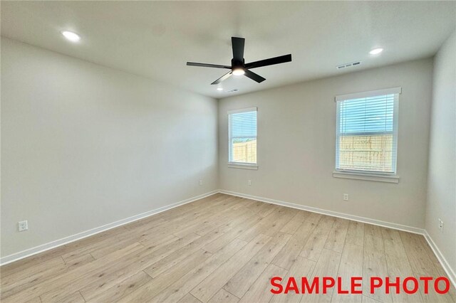 5906 SW Chiefs Rd, Bentonville, AR 72713 - unfurnished room with ceiling fan, light wood finished floors, and recessed lighting
