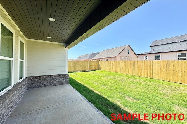 5906 SW Chiefs Rd, Bentonville, AR 72713 - fenced backyard featuring a patio