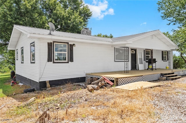 9402 Stone Ln, Omaha, AR 72662 - view of front of property featuring a chimney and a metal roof