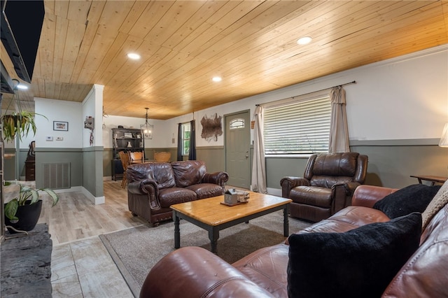 9402 Stone Ln, Omaha, AR 72662 - living room featuring wooden ceiling, recessed lighting, wainscoting, a chandelier, and light wood finished floors
