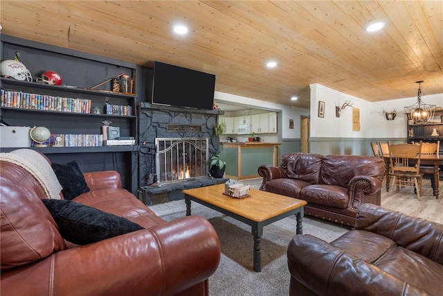 9402 Stone Ln, Omaha, AR 72662 - living room with wooden ceiling, wainscoting, a fireplace, wood finished floors, and recessed lighting