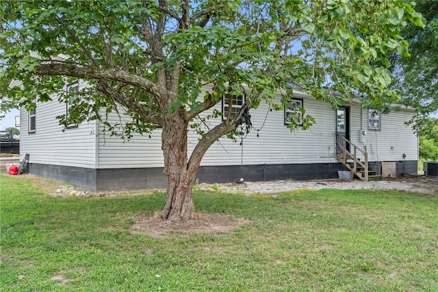 9402 Stone Ln, Omaha, AR 72662 - view of property exterior with entry steps, a yard, and crawl space