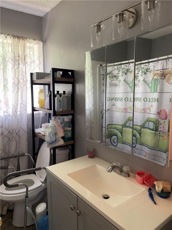 315 Glines Ct, Harrison, AR 72601 - bathroom with toilet and vanity