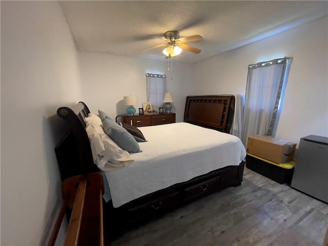 315 Glines Ct, Harrison, AR 72601 - bedroom featuring wood finished floors and a ceiling fan