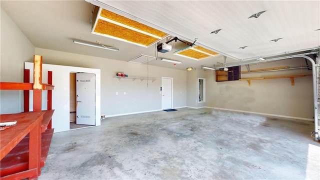 1218 Bradley St, Centerton, AR 72719 - garage featuring a garage door opener