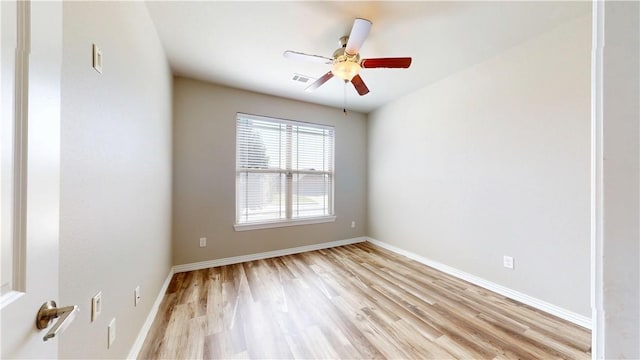 1218 Bradley St, Centerton, AR 72719 - empty room featuring light wood-type flooring and ceiling fan
