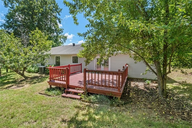 15654 Hickory Ln, Lowell, AR 72745 - rear view of house with a wooden deck and a lawn
