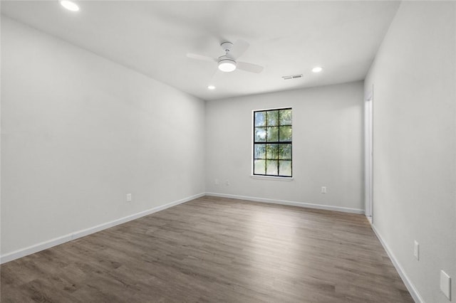 15654 Hickory Ln, Lowell, AR 72745 - spare room featuring ceiling fan, recessed lighting, and wood finished floors