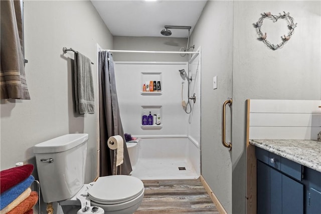 89 Creekview Rd, Harrison, AR 72601 - full bathroom featuring wood finished floors, a stall shower, and vanity