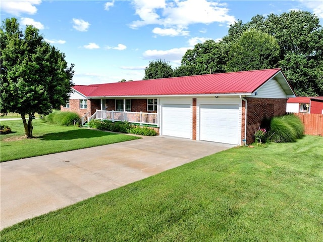89 Creekview Rd, Harrison, AR 72601 - single story home featuring brick siding, a porch, a metal roof, driveway, and a garage