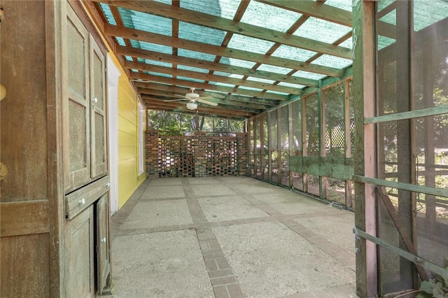 625 W College Ave, Harrison, AR 72601 - unfurnished sunroom featuring a ceiling fan