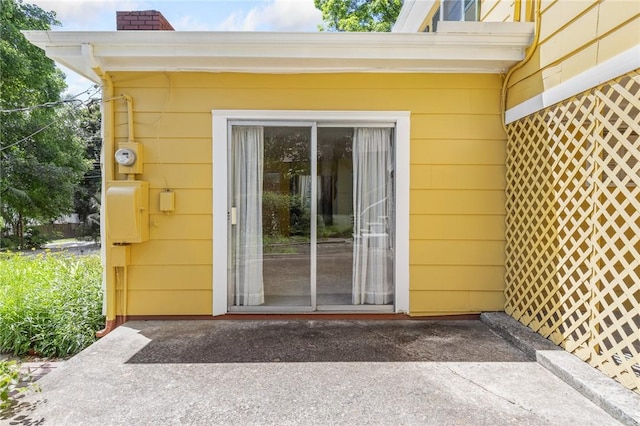 625 W College Ave, Harrison, AR 72601 - doorway to property with a chimney