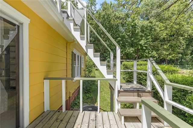 625 W College Ave, Harrison, AR 72601 - wooden deck featuring stairway and view of scattered trees