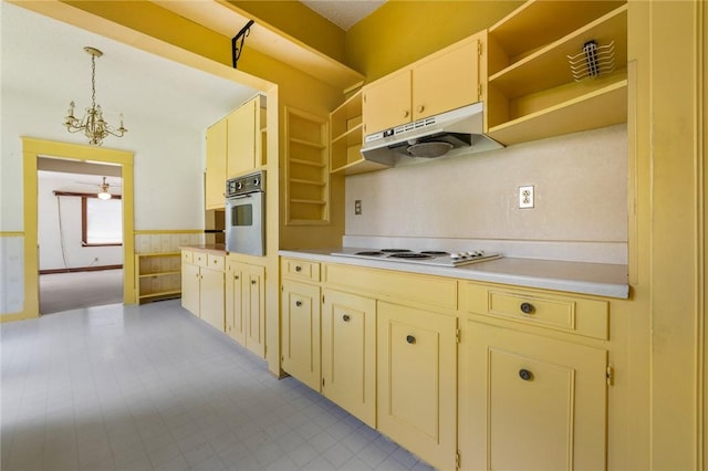625 W College Ave, Harrison, AR 72601 - kitchen featuring open shelves, cream cabinetry, under cabinet range hood, and a wainscoted wall