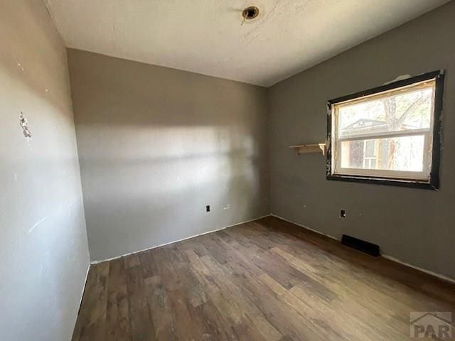 1726 W 12th St, Pueblo, CO 81003 - unfurnished room with wood finished floors