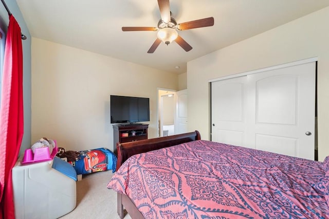 1037 W Desert Sage Dr, Pueblo West, CO 81007 - bedroom with carpet, a closet, and a ceiling fan