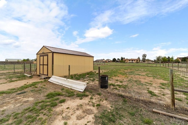 1037 W Desert Sage Dr, Pueblo West, CO 81007 - view of shed featuring a view of rural / pastoral area
