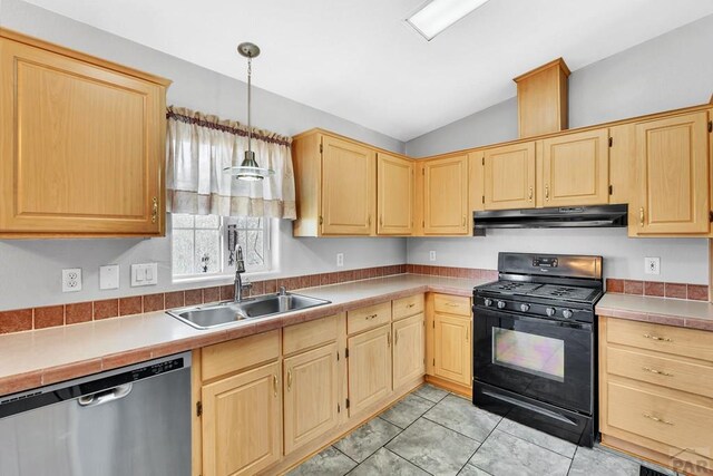 kitchen featuring under cabinet range hood, a sink, stainless steel dishwasher, black range with gas stovetop, and pendant lighting