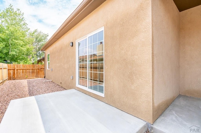 exterior space with a fenced backyard