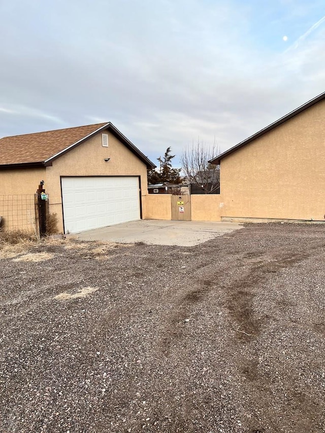 exterior space with a gate and fence