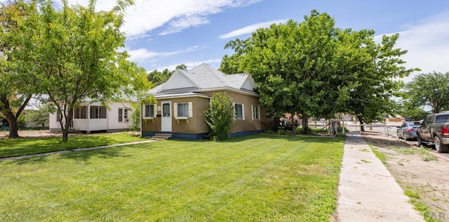502 8th St, Fowler, CO 81039 - view of side of property featuring a yard and entry steps