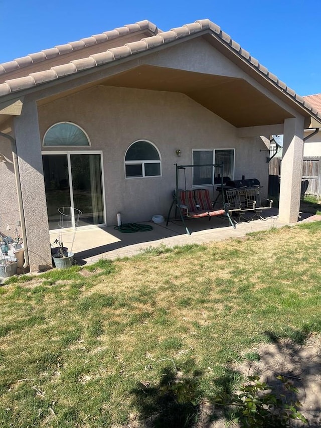 4706 Solar Dr, Pueblo, CO 81005 - back of property with a yard, a patio, and stucco siding