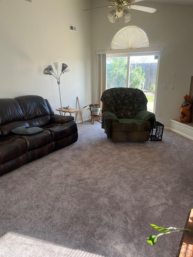 4706 Solar Dr, Pueblo, CO 81005 - living area with carpet floors, ceiling fan, a towering ceiling, and visible vents